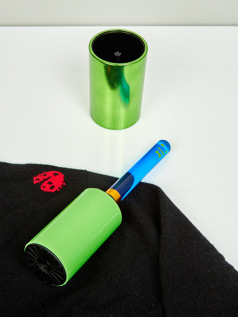 Green Lint Roller by Staff and a lady bug sweater.