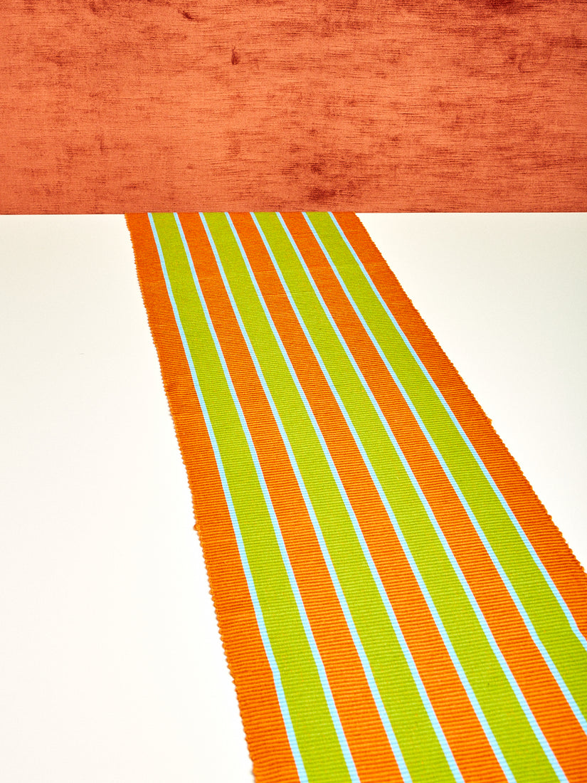 Orange, olive green, and light blue striped table runner by Dusen Dusen.