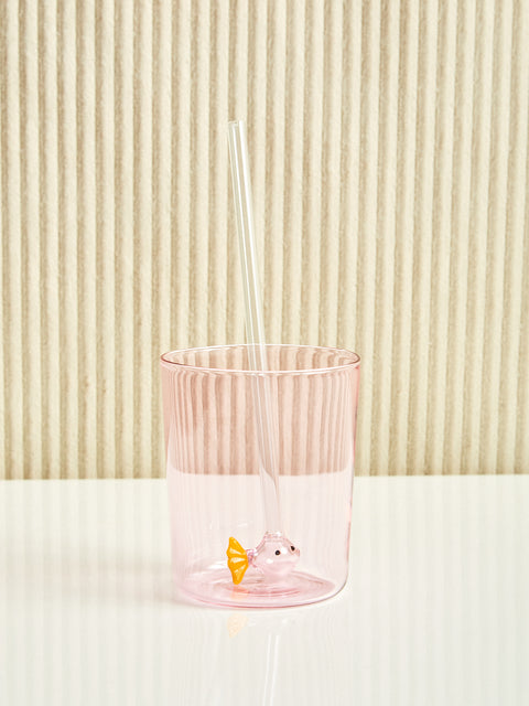 A pink and yellow fish straw sit inside of a pink cup.