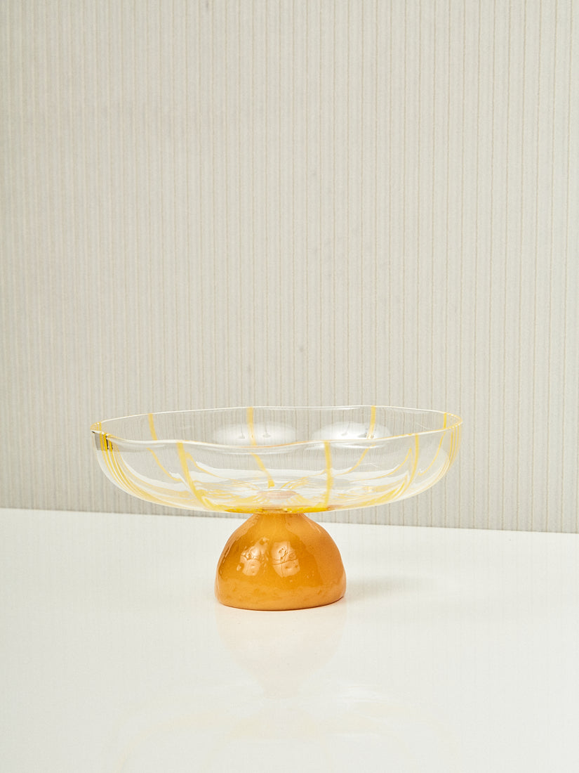 Grand Soleil Platter by Maison Balzac featuring a half lemon base and clear with yellow striped dish.