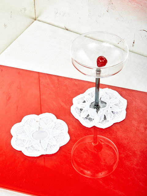 Lace Slippers for Stemware with one Manhattan Glass wearing one of the slippers.