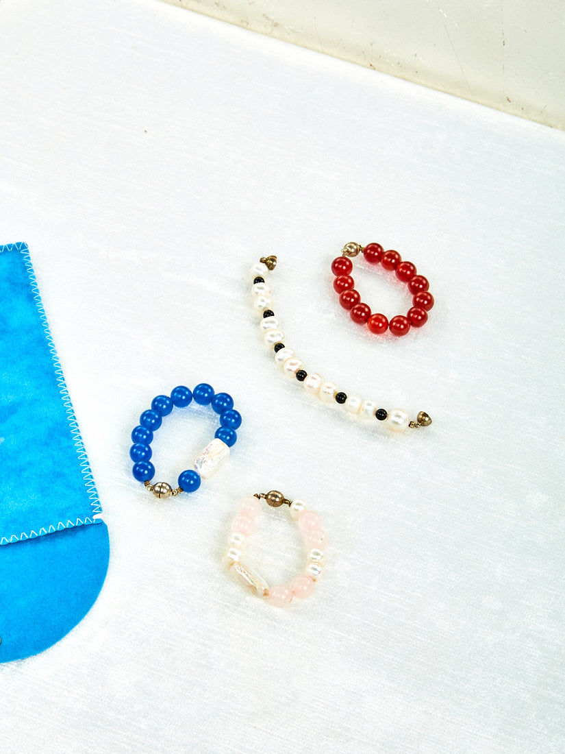 Four different bracelets for stemware by Gohar World.