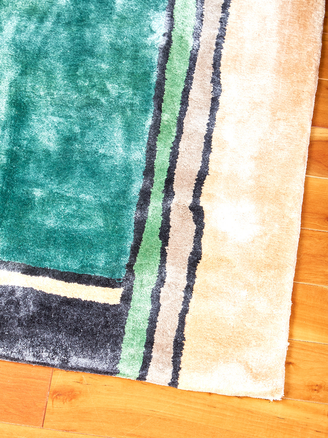 Close up picture of Frames Rug by cold picnic. Shows the lines and colors up close.