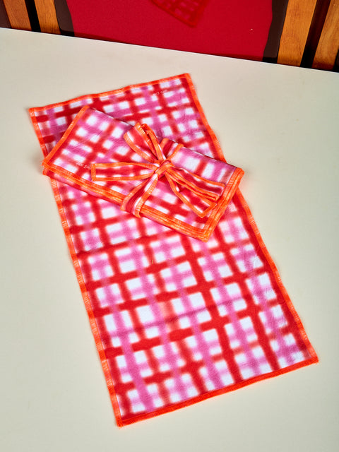 Single picture of Airbrush napkins showing pink and red. They are airbrushed in a grid shape.