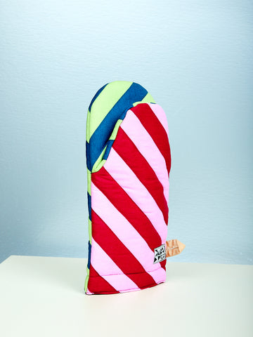 Colorful striped oven mitt on a light blue background
