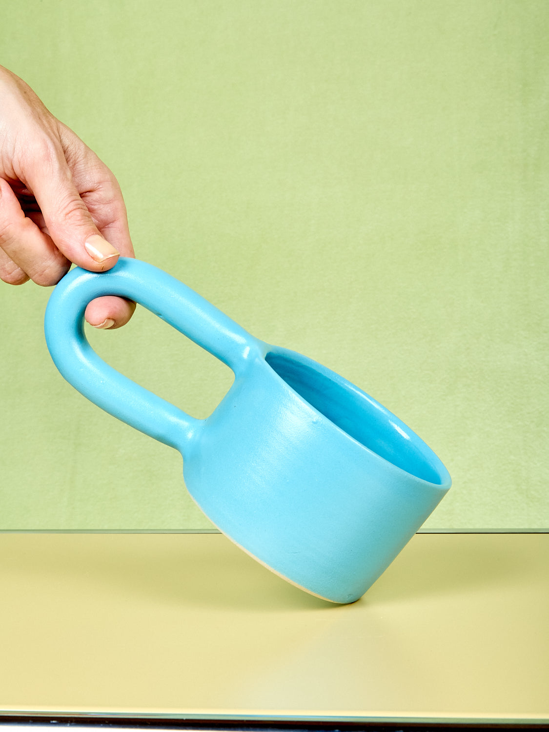 Blue short stoneware mug by Workaday Handmade