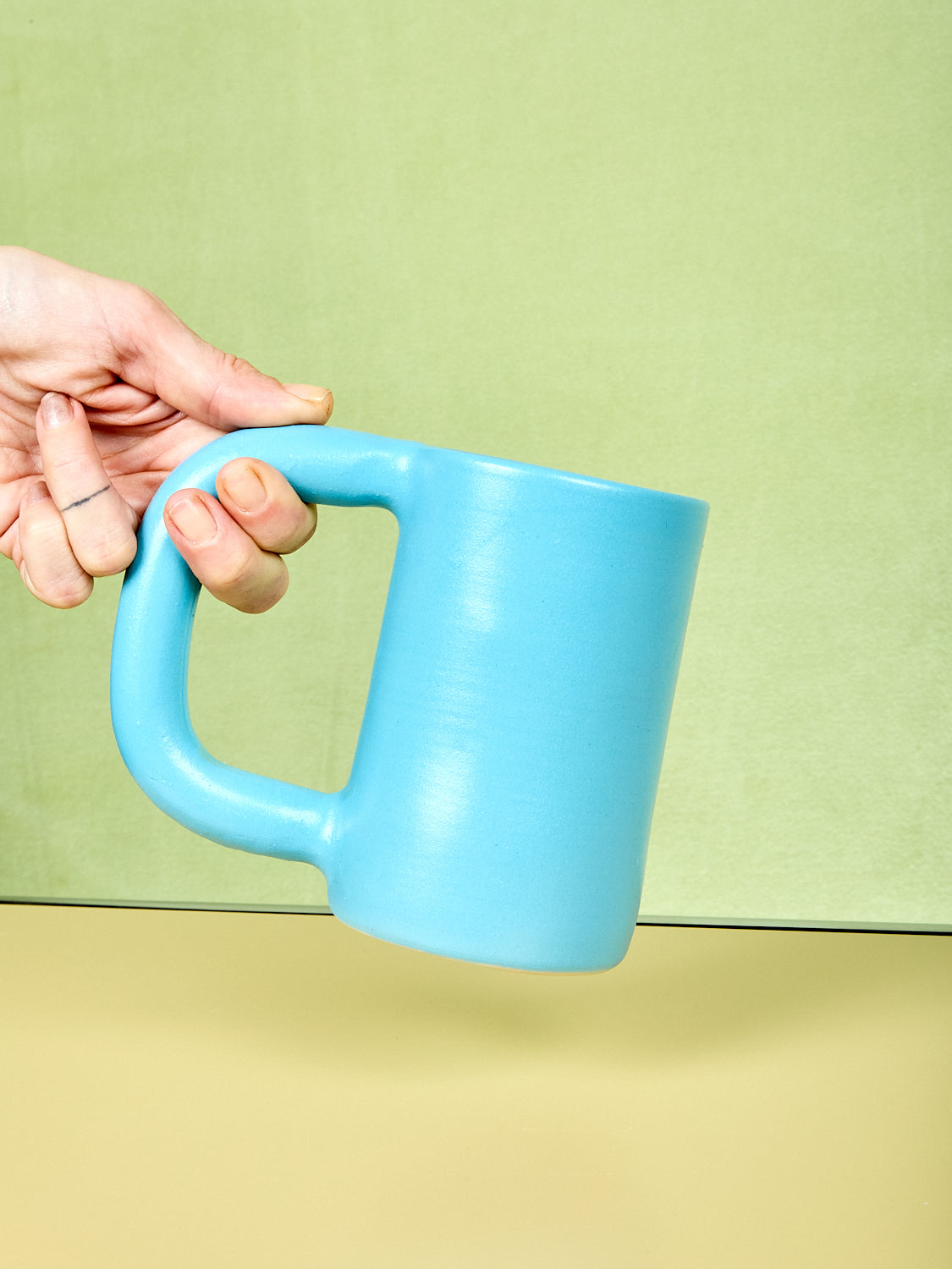 Blue tall stoneware mug by Workaday Handmade