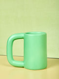 Green tall stoneware mug by Workaday Handmade