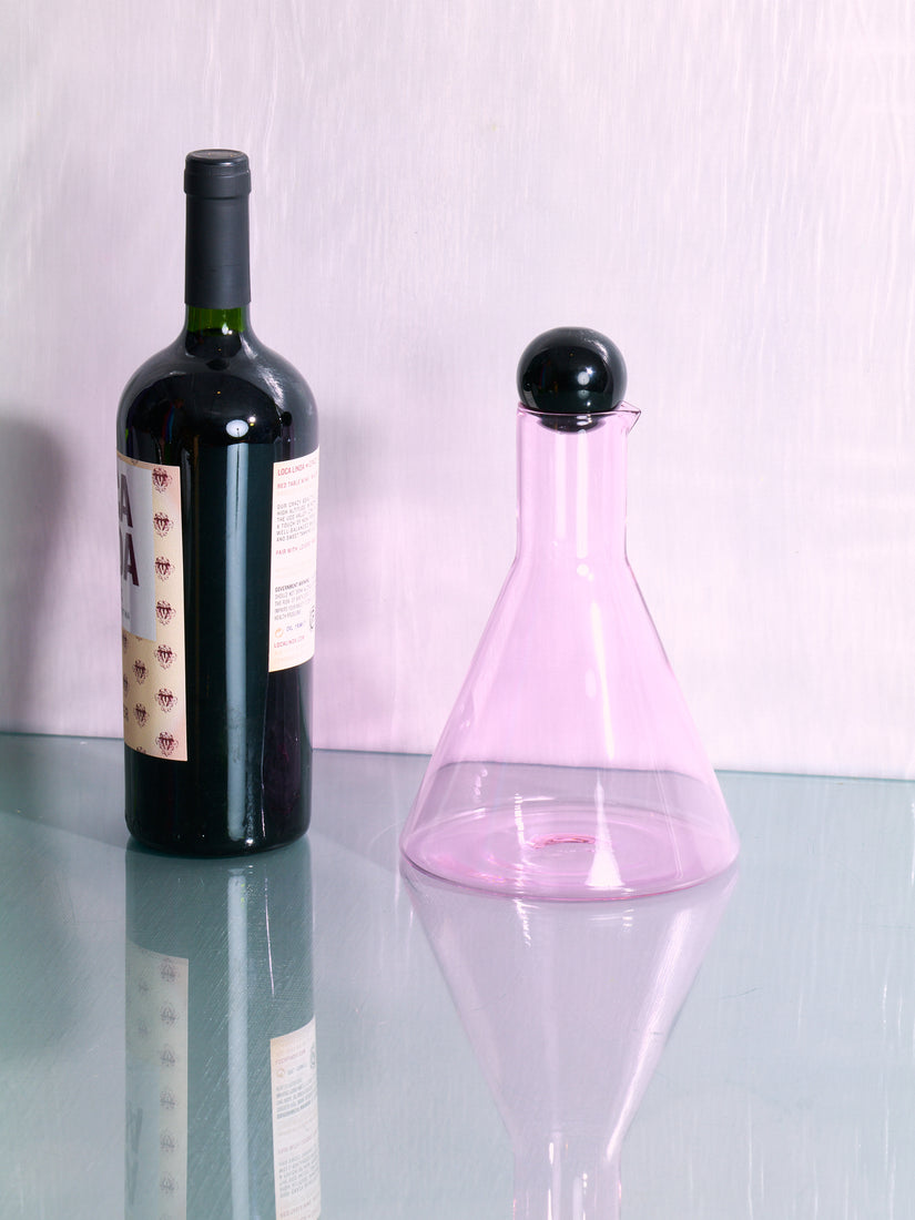 Bilboquet Carafe by Sophie Lou Jacobsen and a bottle of red wine.