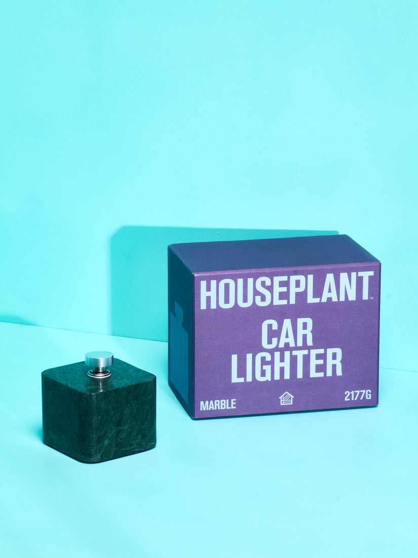 Marble block lighter with Car Lighter component. Houseplant branded box sitting beside.
