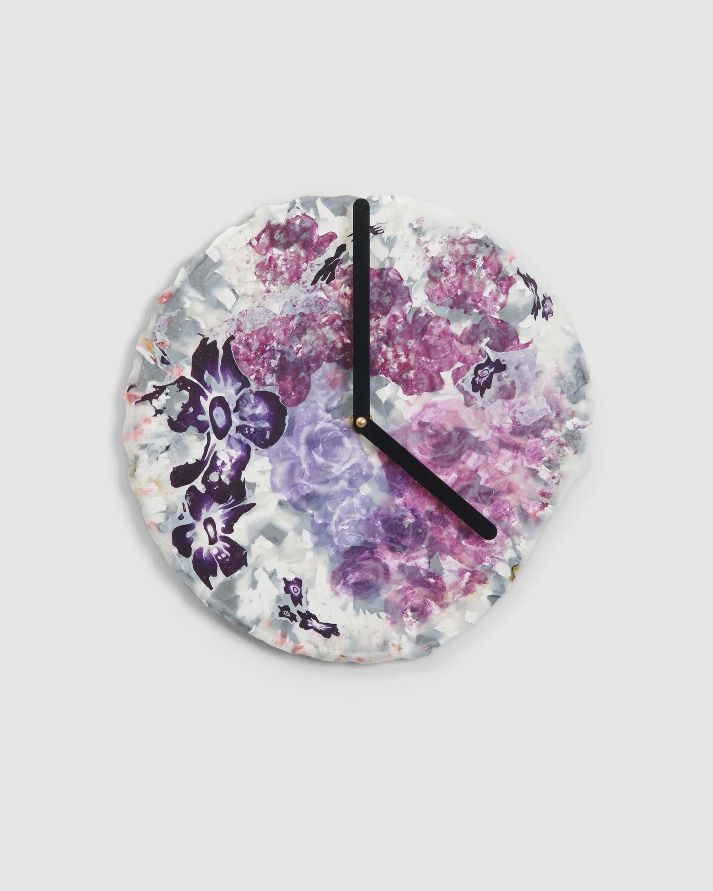 Thank You Clock by Chen Chen and Kai Williams. Composed of plastic bags in floral design.