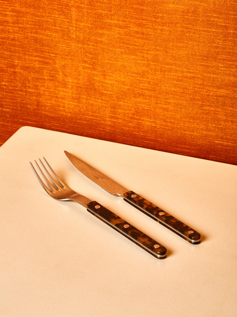 A dinner fork and knife by Sabre in tortoise.