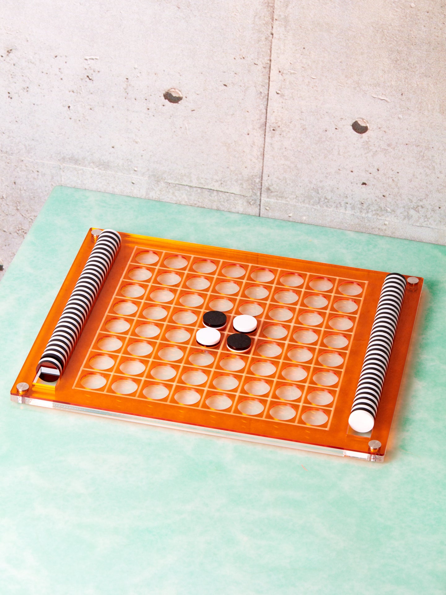 Orange El Reverso Othello Game by Luxe Dominoes.