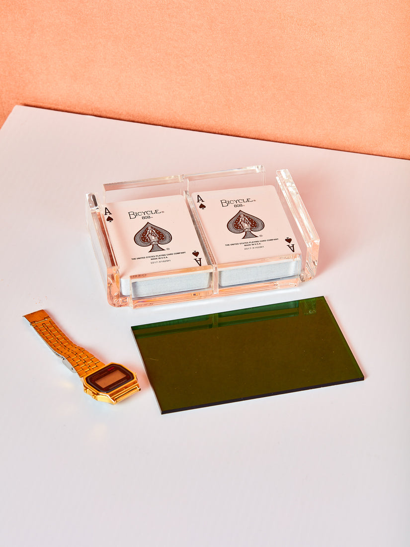 Green Set of Luxe Playing Card by Luxe Dominoes. An acrylic case with a colored transparent acrylic lid and two decks of bicycle playing cards inside.