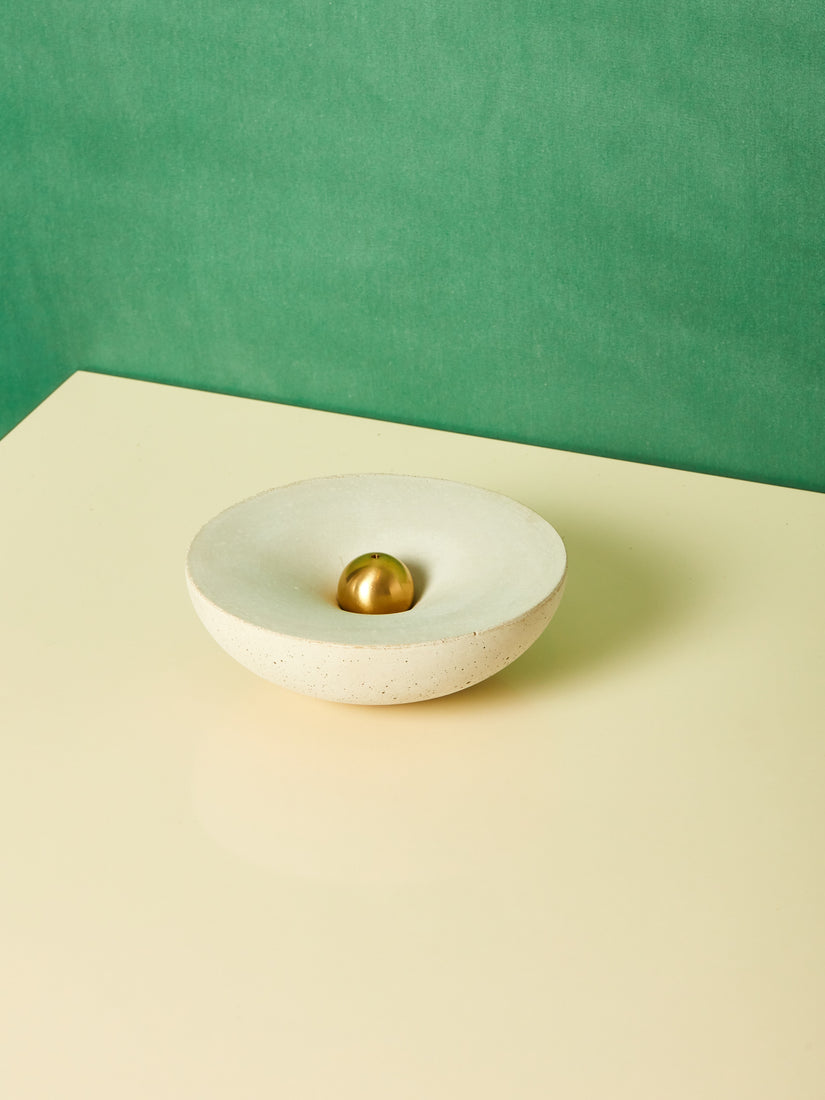 Concrete dish and brass ball incense holder.