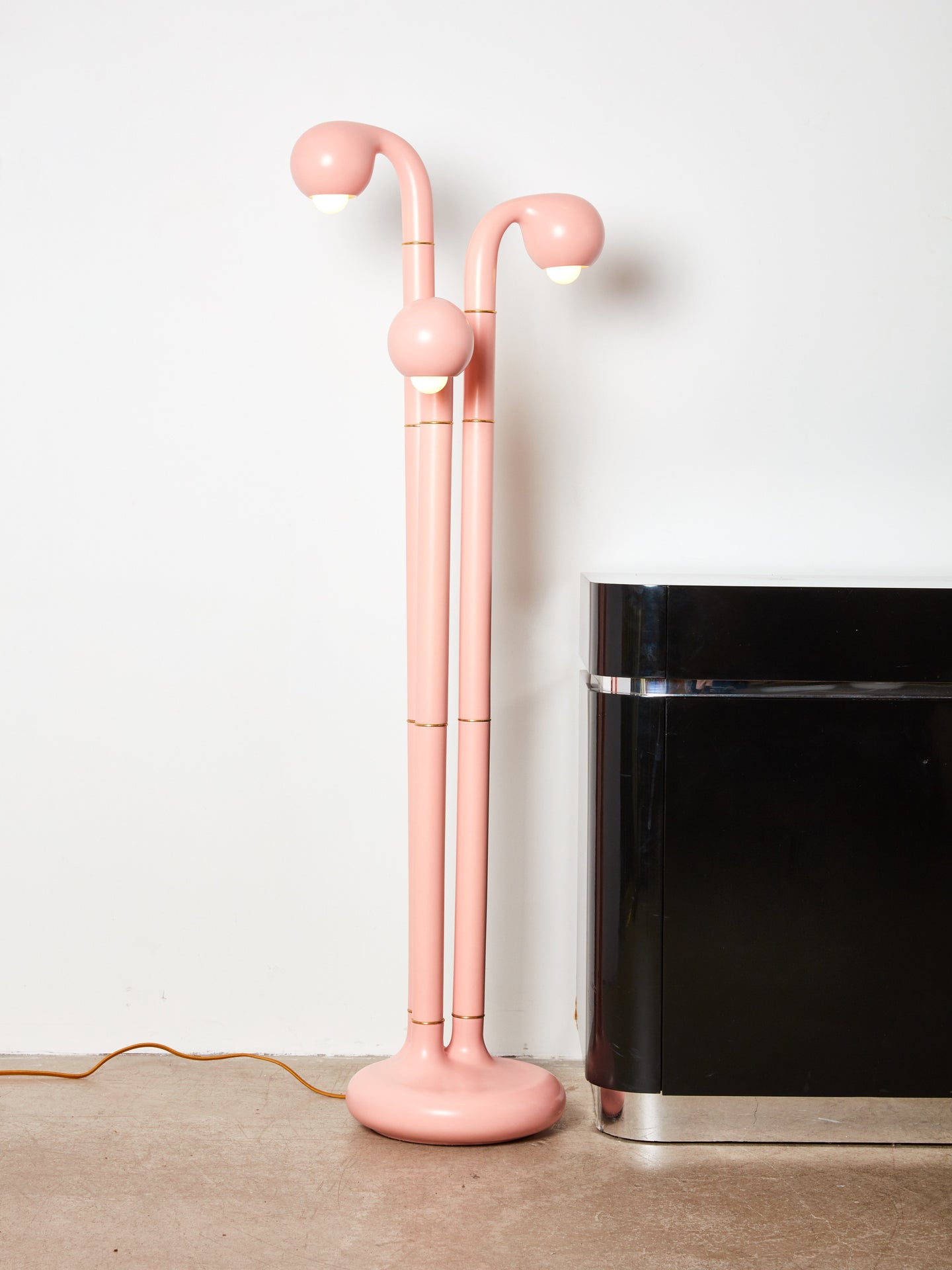 Three globe ceramic floor lamp in pink by Entler.