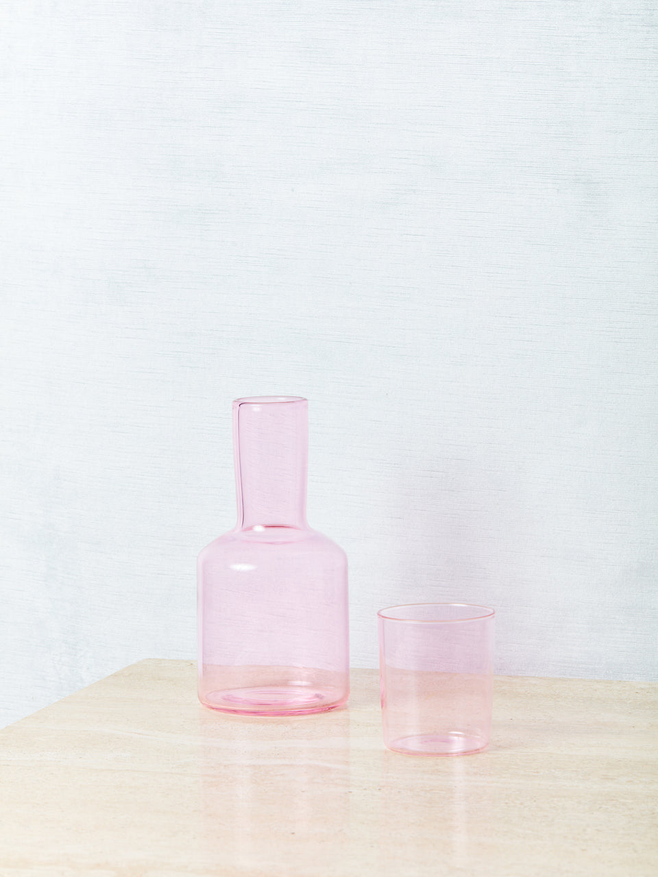 A pink bedside carafe by Maison Balzac.