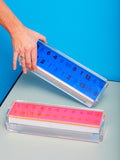 A blue Rummy Tile Game and pink Rummy by Luxe Dominoes.