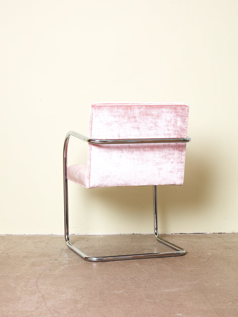 The back of a Pink Velvet Brno Chair.