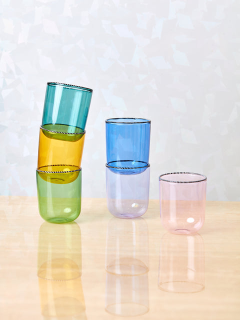 Stack of 3, 2, and 1 striped rim glasses by Fredericks and Mae.