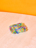 A single rainbow sponge.