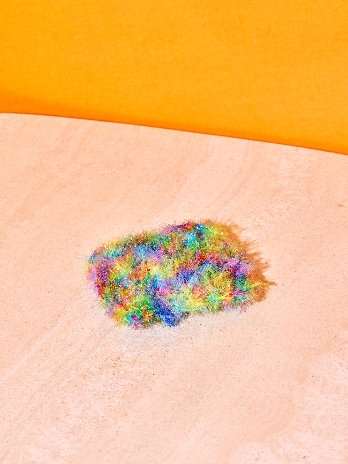 A single rainbow sponge.