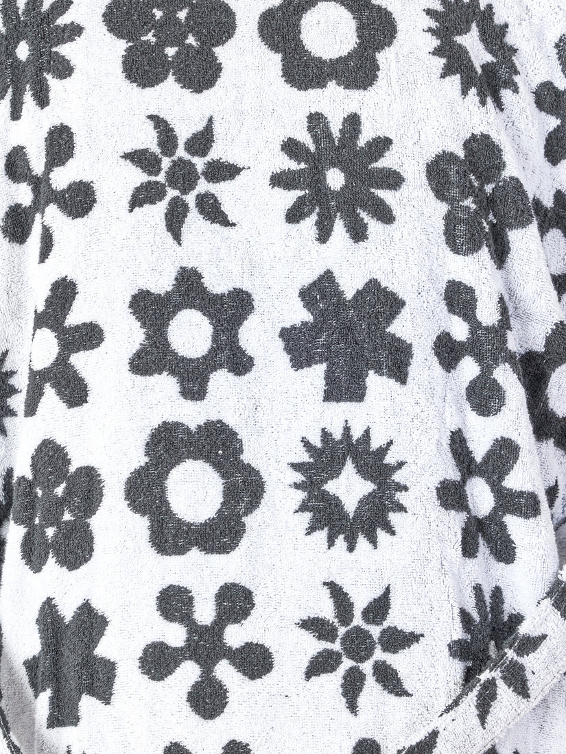 A close up of Dusen Dusen's flower pattern black and white robe.