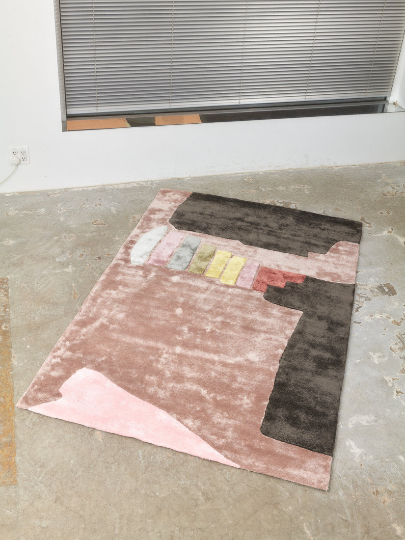 4x6 The Dessert Rug by Cold Picnic on a concrete floor.
