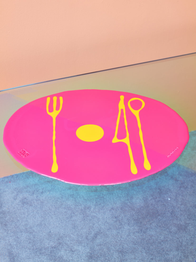 A fuchsia/yellow Opaque Table-Mates Placemat by Gaetano Pesce for Fish Design.