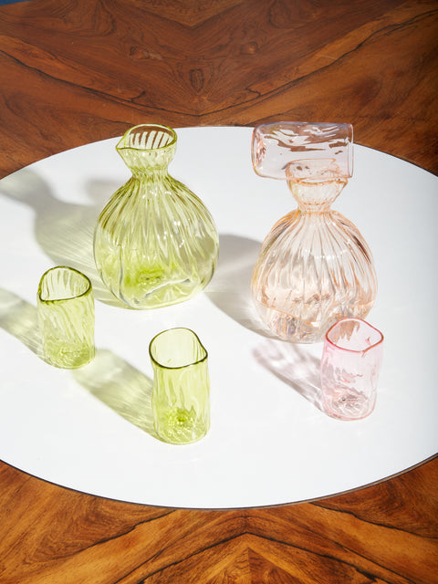 One pink and one green Sake Set by Iannazzi Glass.