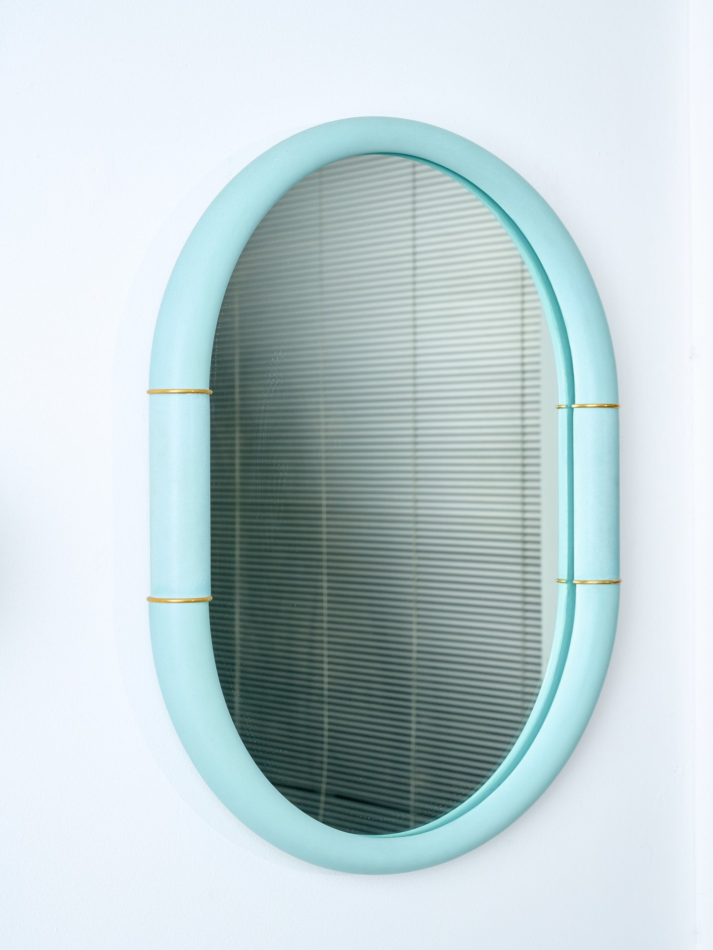 Ceramic Mirror in blue by Entler Studio.