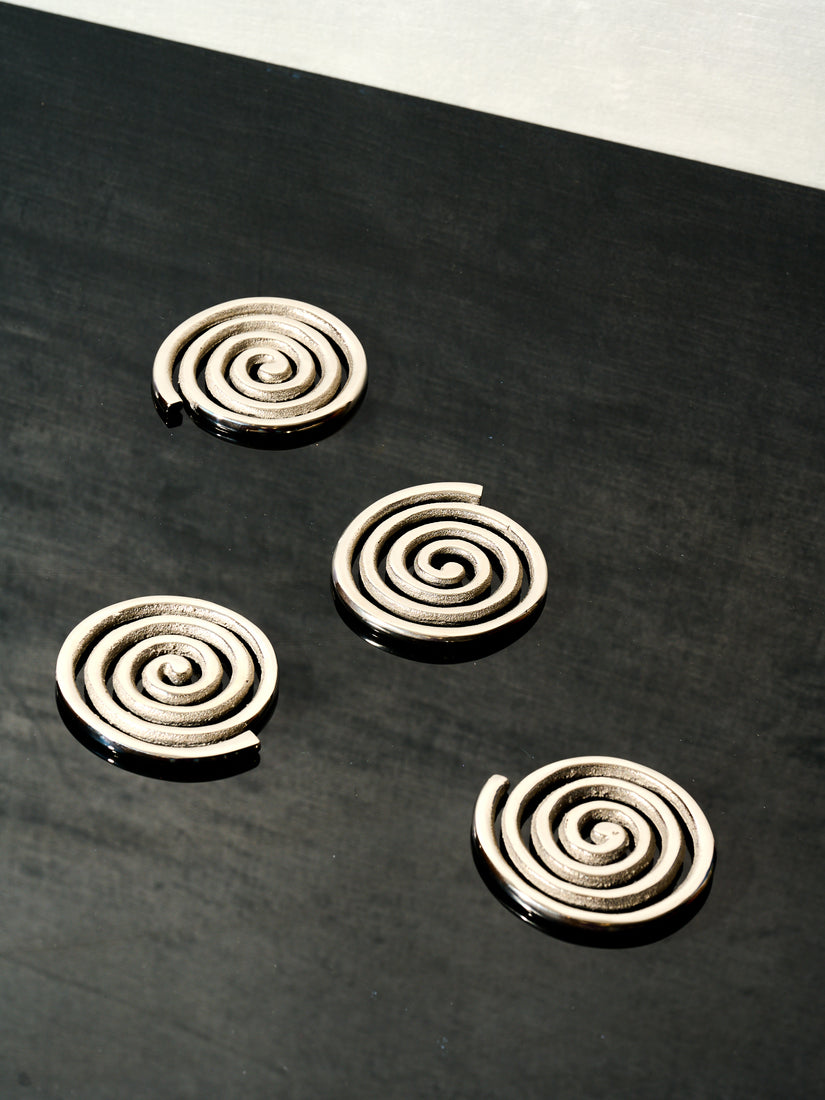 Set of 4 Spiral Coasters by Sophie Lou Jacobsen.