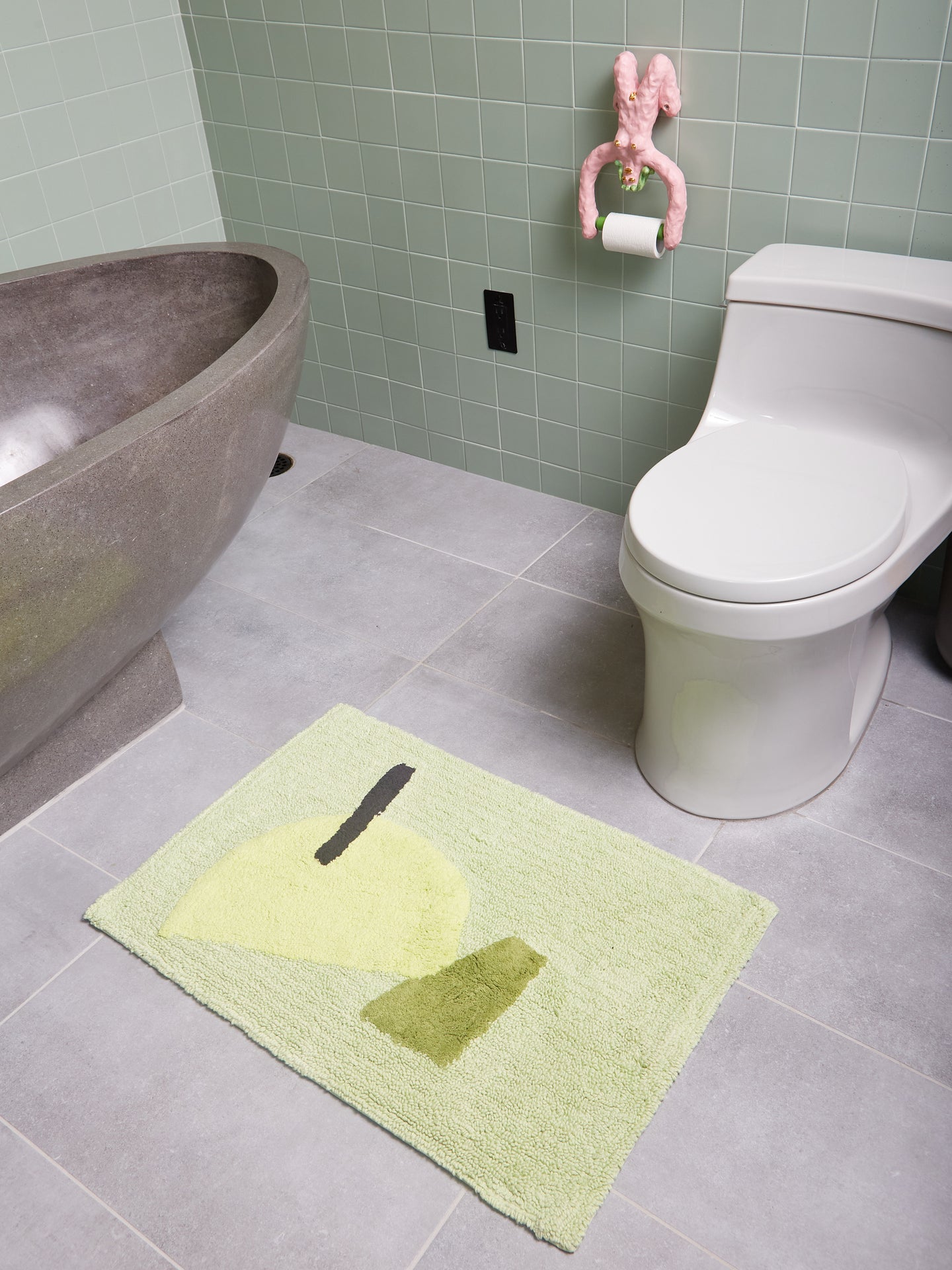 Medium Cool Bath Mat in a neutral sage and grey toned bathroom.