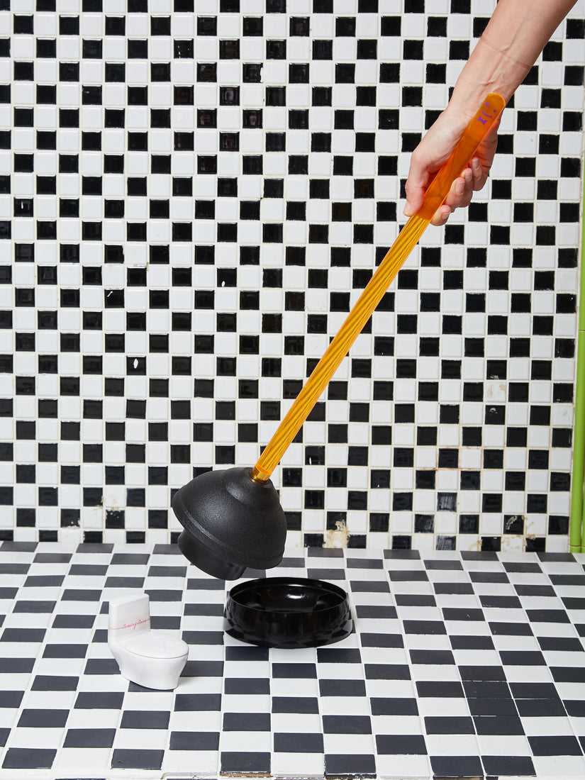 The Plunger by Staff in orange.