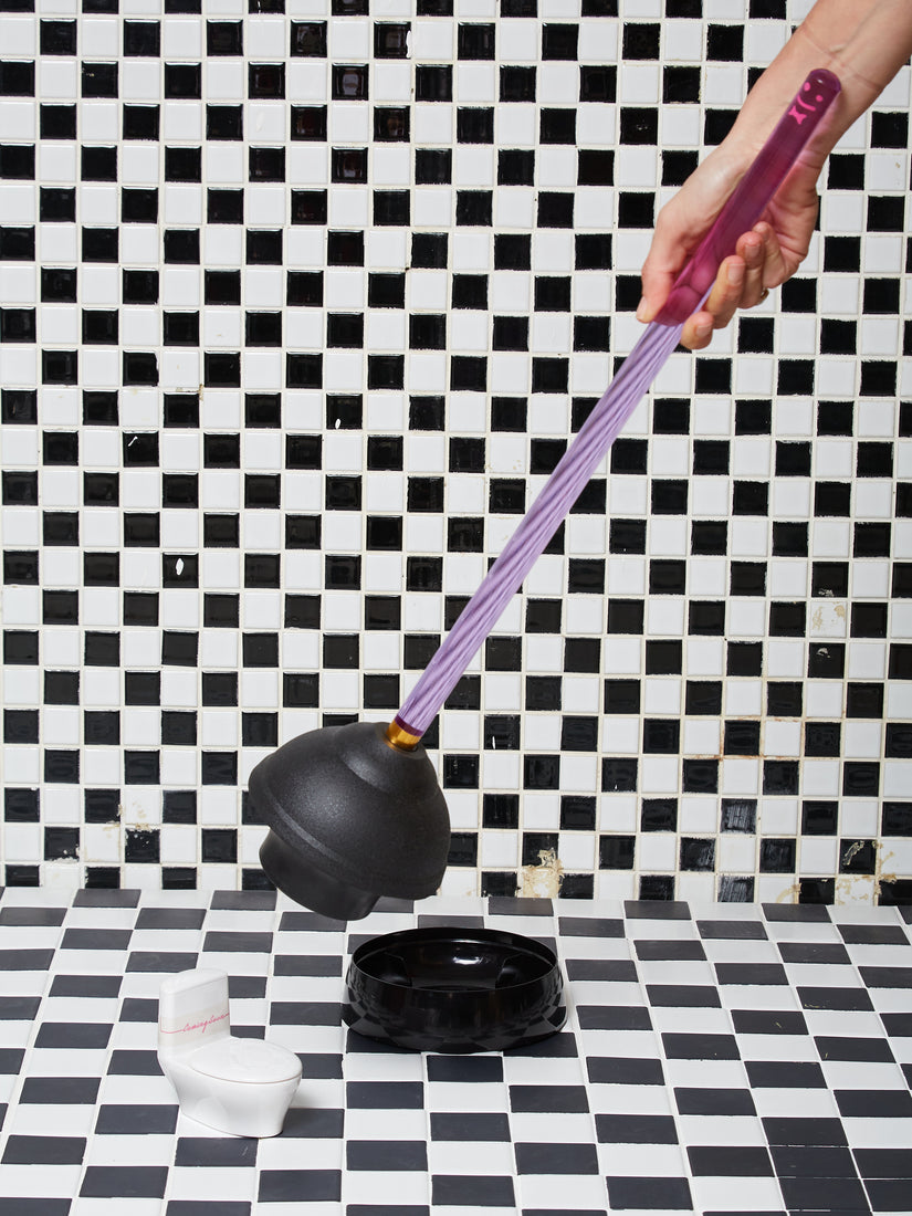 The Plunger by Staff in purple.