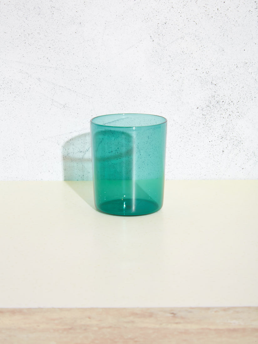 A single teal cup by Maison Balzac.