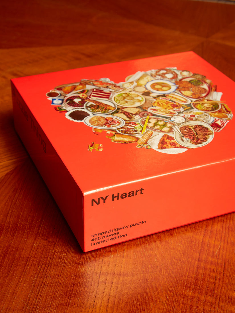 The corner of the NY Heart Puzzle Box showing "NY Heart shaped jigsaw puzzle, 465 pieces, limited edition*