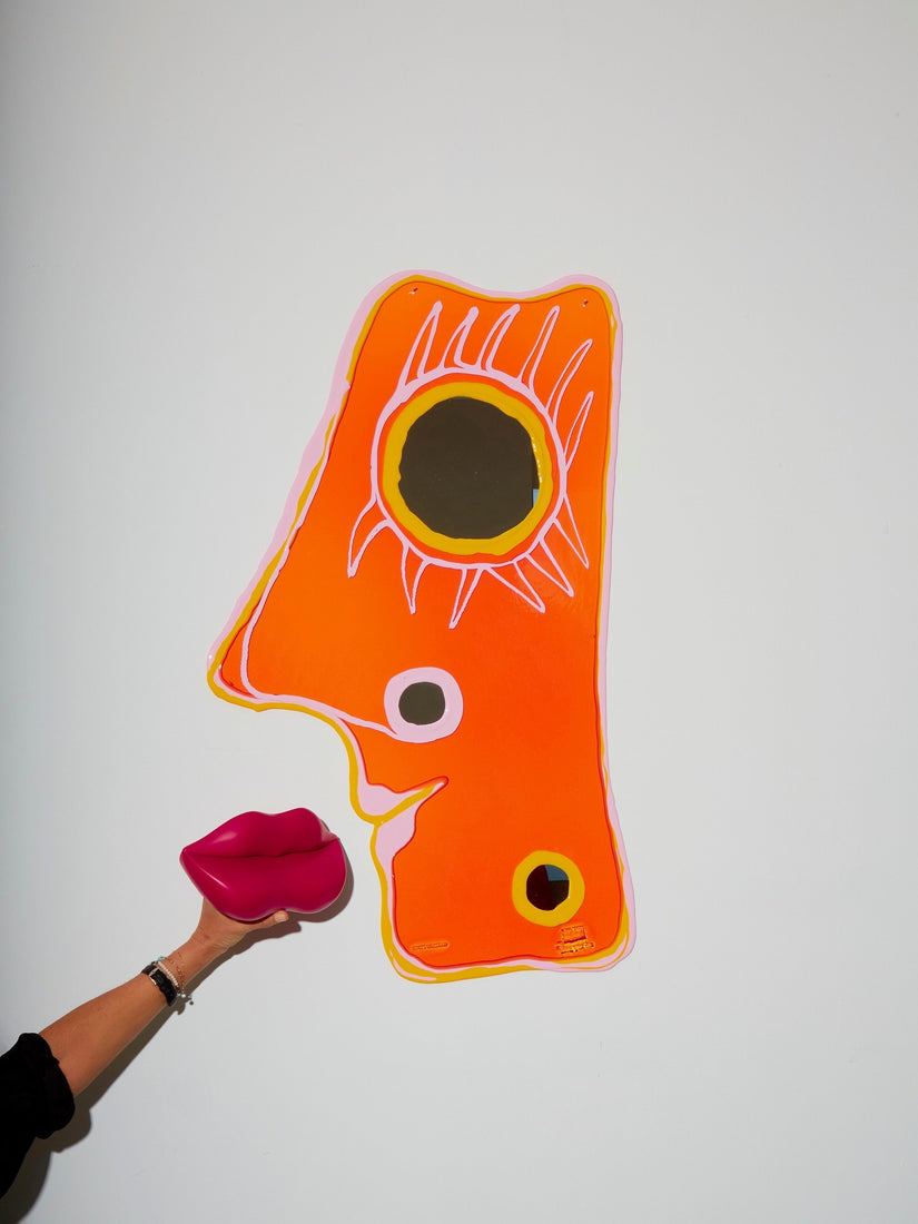 Look At Me Mirror by Gaetano Pesce for Fish Design in orange with pink and yellow accents.