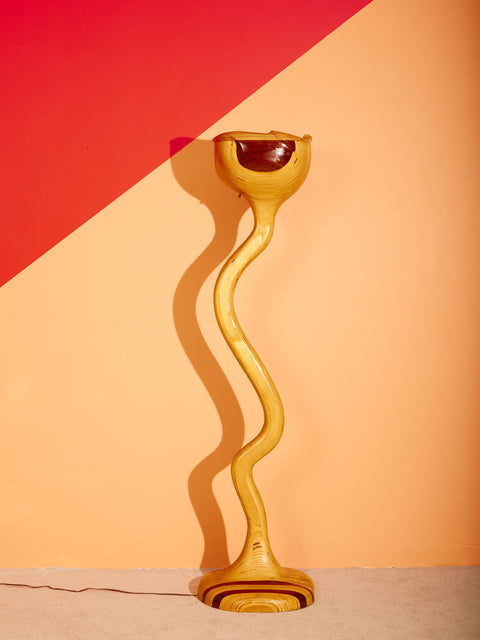 Sculptural Wooden Floor Lamp with a wavy side profile.