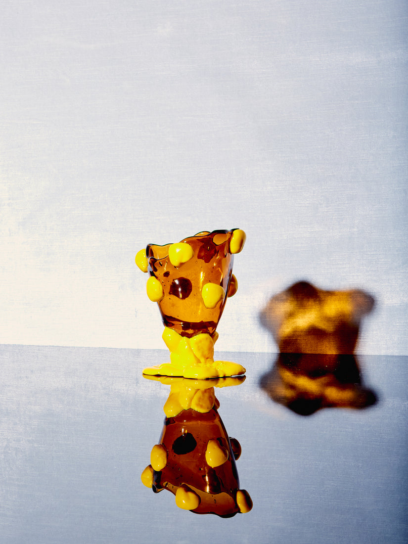 A mini Nugget Vessel by Gaetano Pesce for Fish Design in brown/yellow.