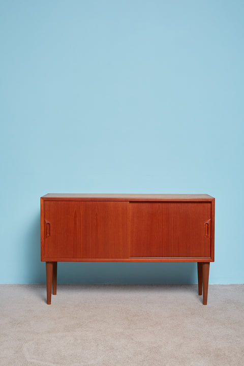 Vintage Sideboard with sliding cabinet doors.