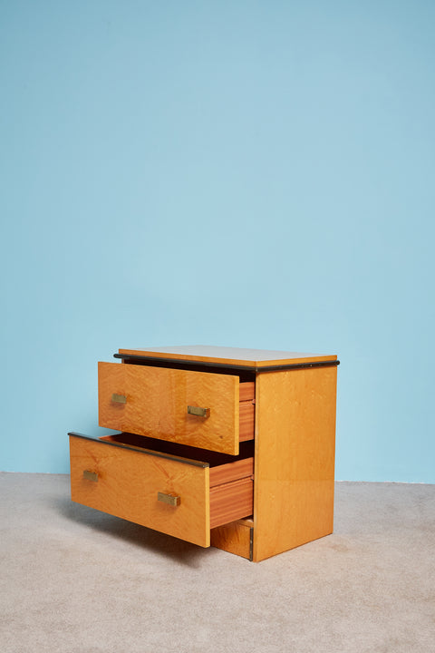 A single Vintage Birdseye Nightstand with its drawers open.