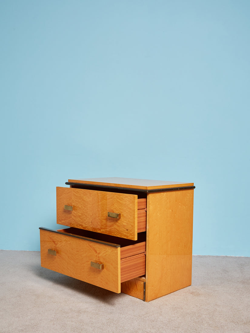 A single Vintage Birdseye Nightstand with its drawers open.