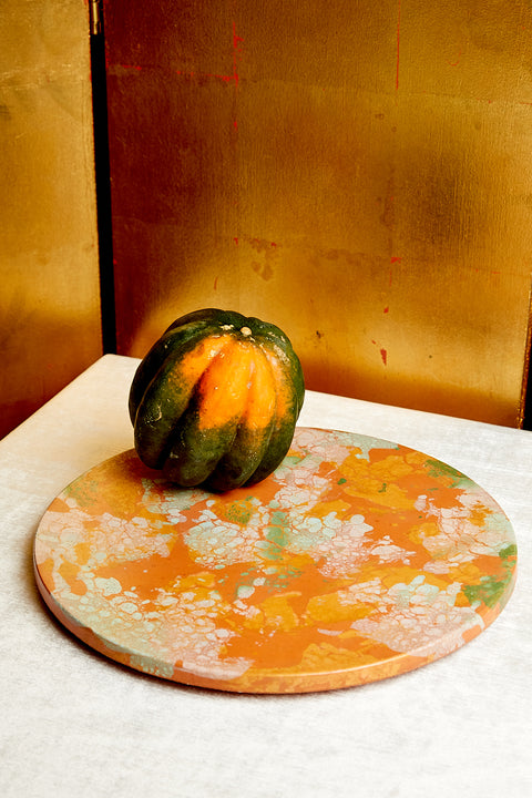 A squash sits atop the Concrete Cat Lazy Susan.