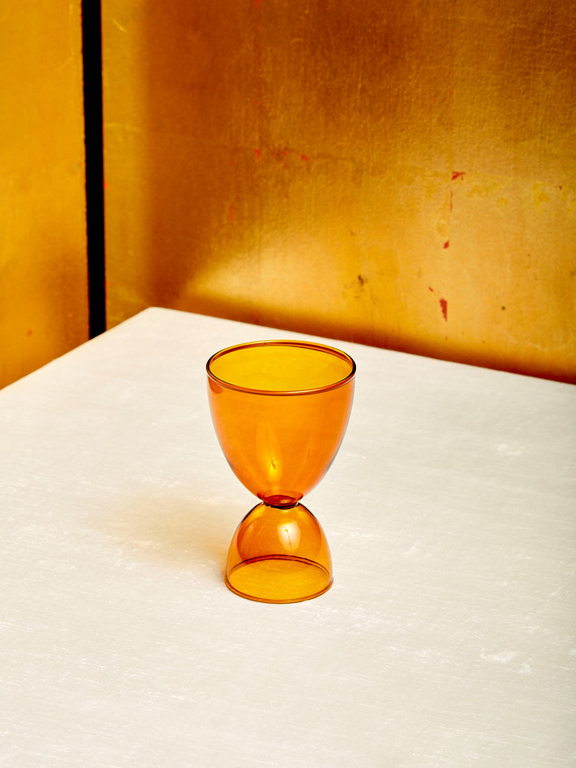 An amber cocktail glass.