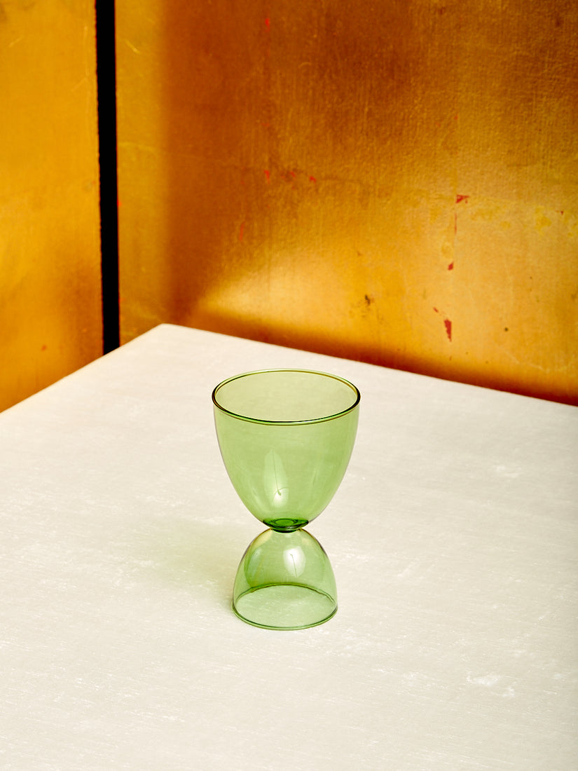 A green cocktail glass.