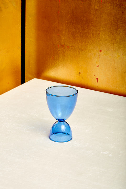 A blue cocktail glass.