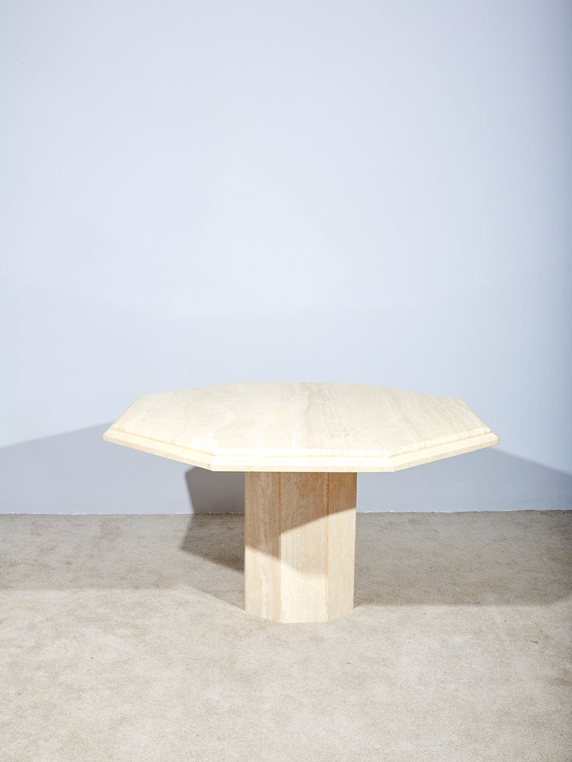 Vintage Travertine Dining Table with an octagonal top and pedestal base.