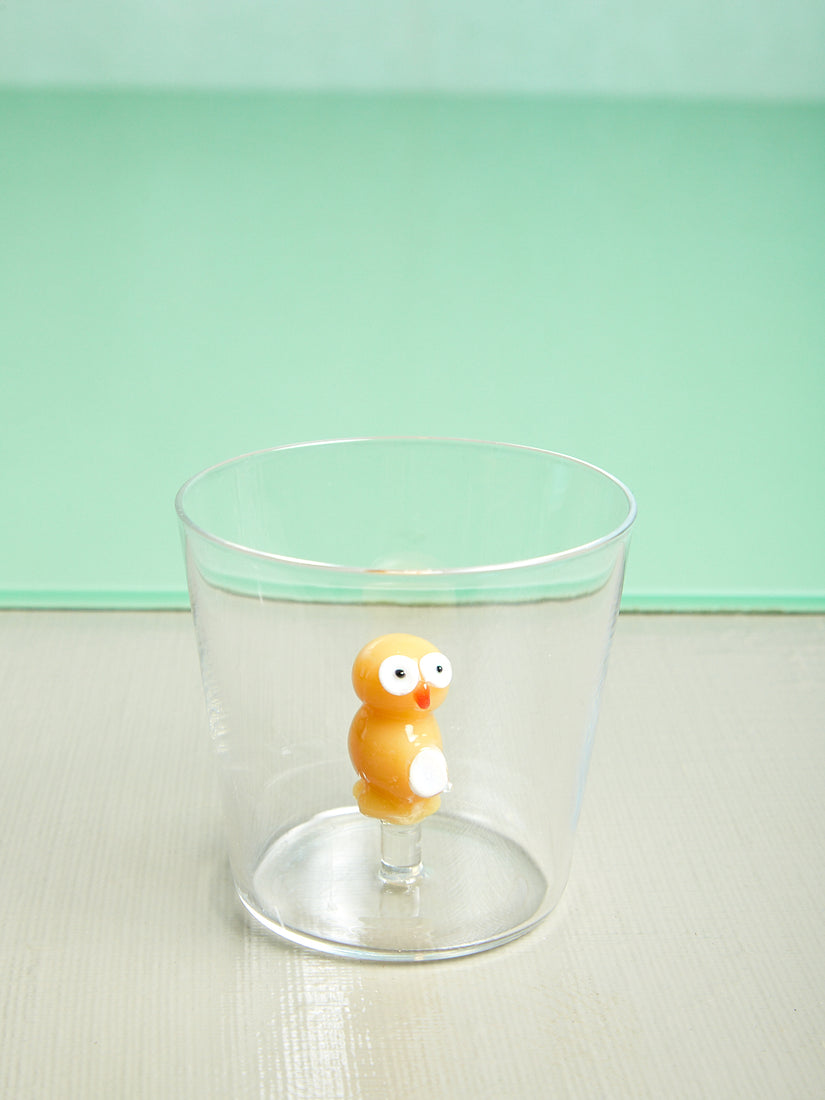 Animal Tumbler with a an owl inside.  The owl is opaque yellow with white wings and an orange beak.