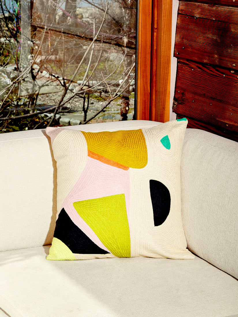 Light Bright Pillow by Cold Picnic featuring cream, beige, mustard, orange, pink, chartreuse, teal, black, and lime green.